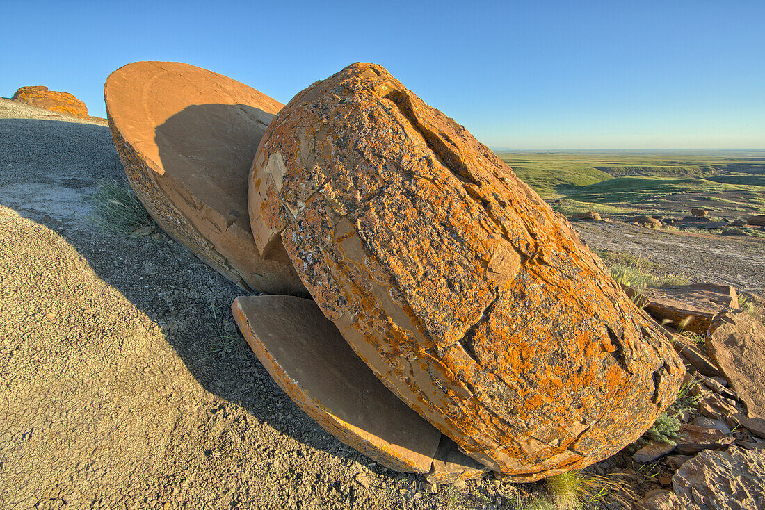 'Large fractured red rock, Red Rock Coulee; Alberta, Canada'