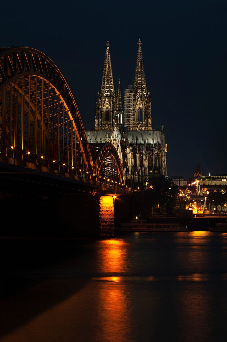 'Hohenzollern Bridge over the River Rhine and Cologne Cathedral; Cologne, Germany'