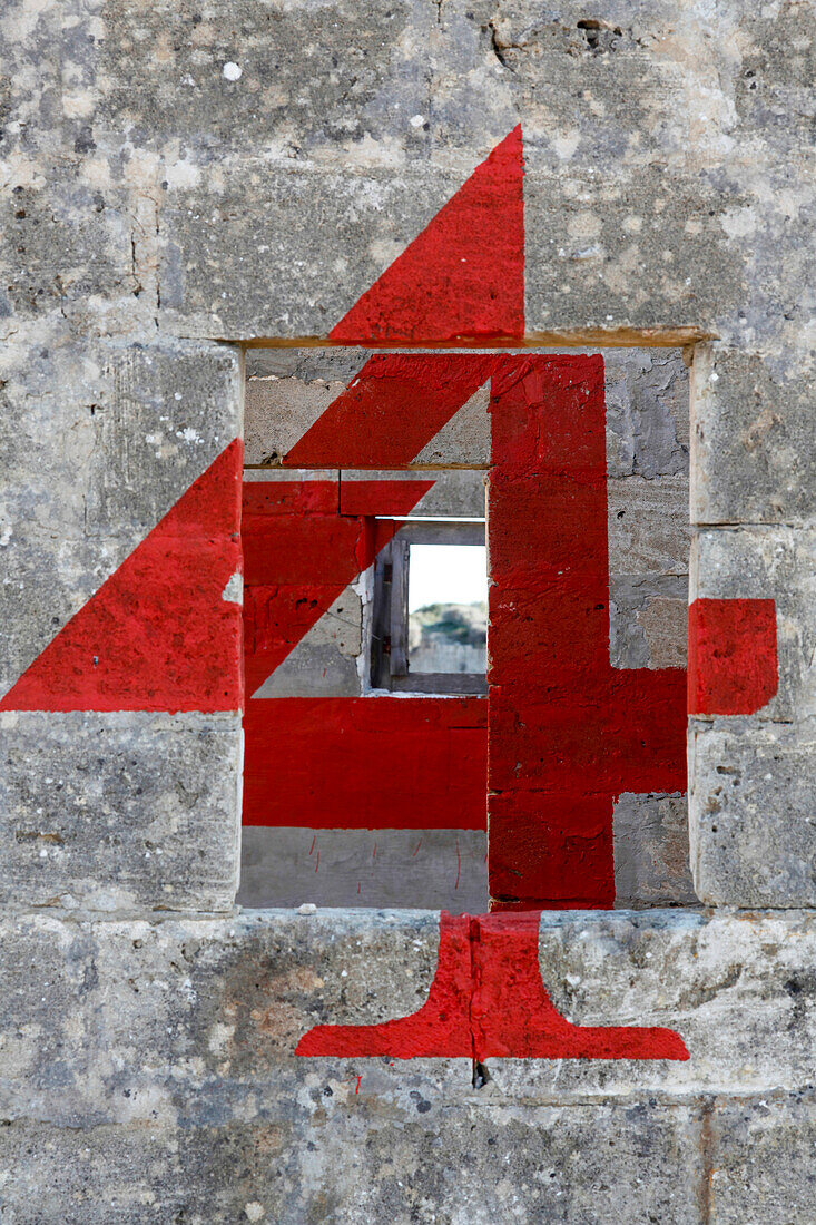 Red number four at a house wall, Noto, Syracuse, Sicily, Italy