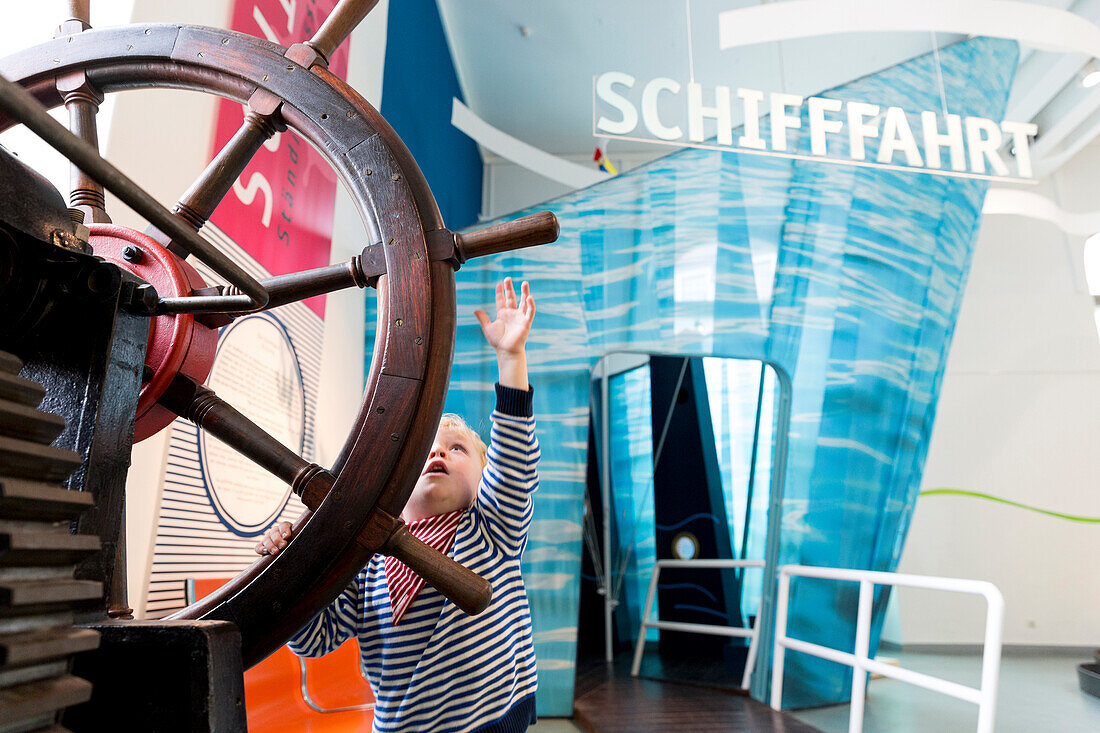 Boy at a wheel, Transport Museum, Dresden, Saxony, Germany