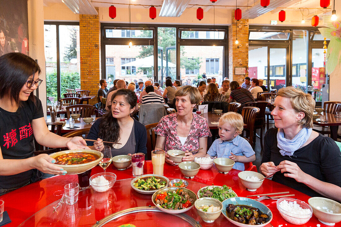 Women in a Chinese restaurant, Leipzig, Saxony, Germany