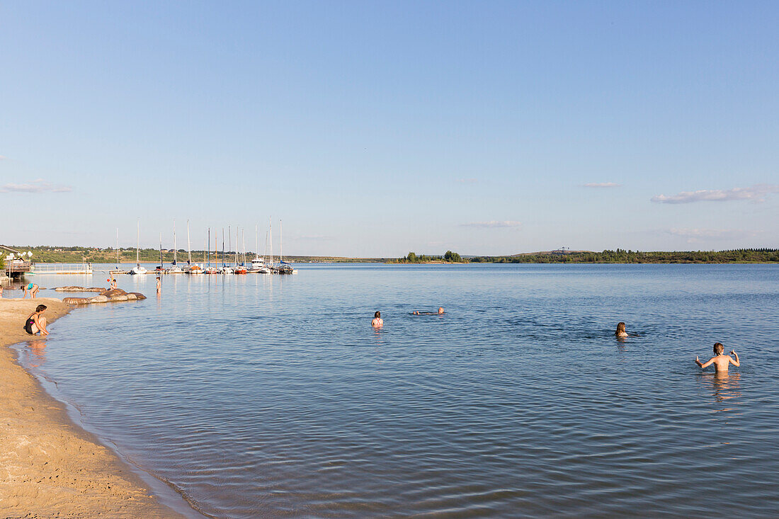 People bathing in lake Markkleeberg, Markkleeberg, Saxony, Germany