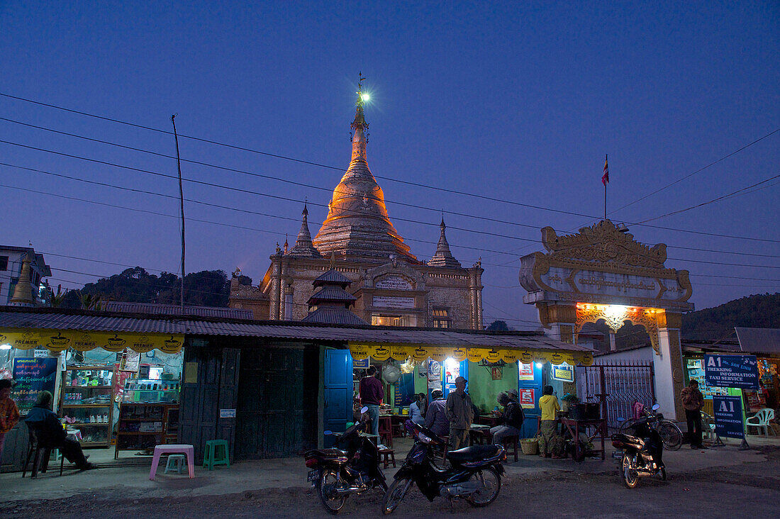 Silver pagoda with market stalls in the evening, Aung Chaung Naung Pagoda, in Kalaw, Shan State, Myanmar, Burma