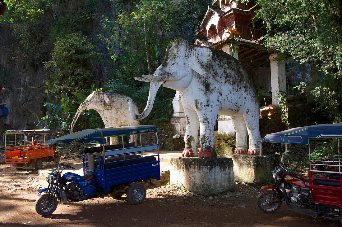 Stone elephants at the entrance to Saddan cave near Hpa-An in Kayin State, Myanmar, Burma