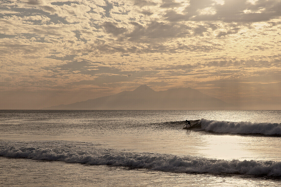 Surfer riding a wave, Praia, Santiago, Cape Verde