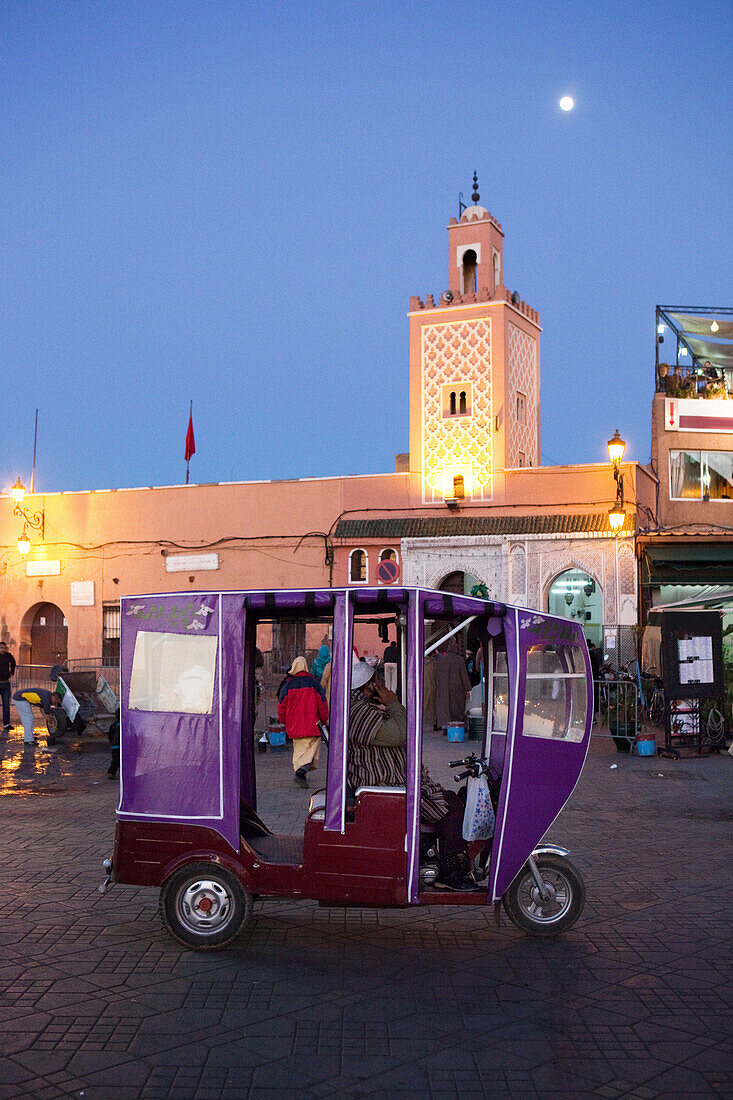 Tricycle on the market square, Djemaa el Fna, Marrakech, Morocco