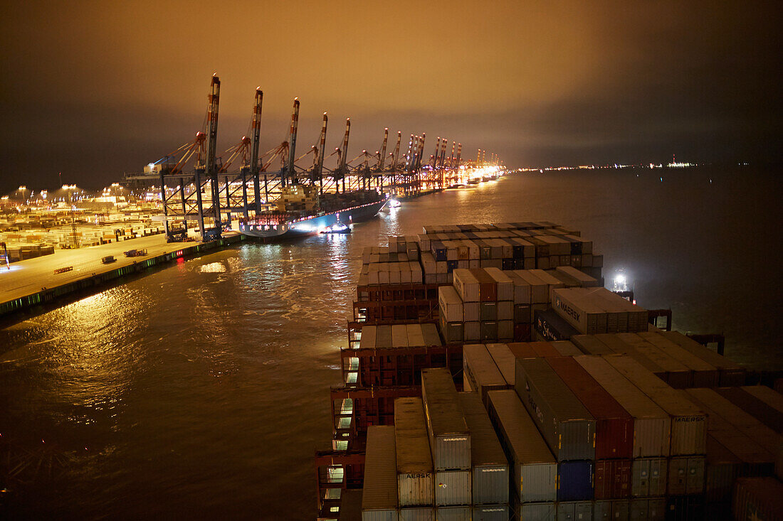 Container ship in harbor at night, Bremerhaven, Bremen, Germany