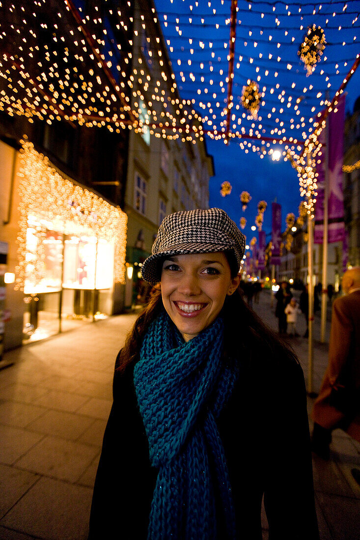 Young woman at a christmas market, Graz, Styria, Austria