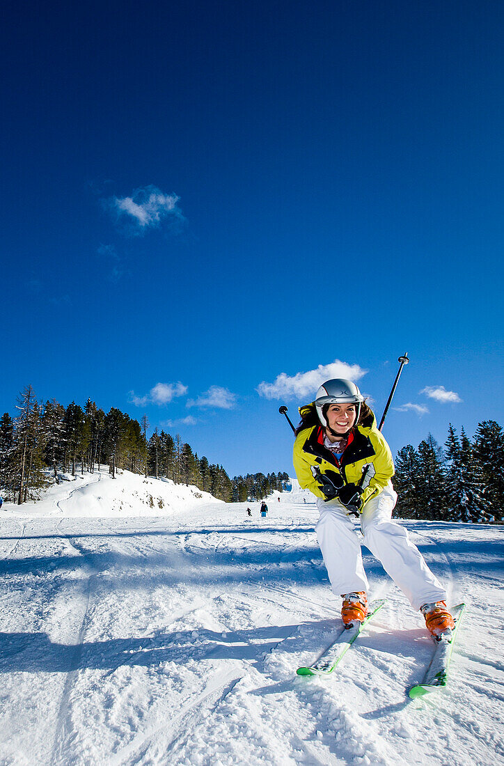 Woman downhill skiing, Kreischberg, Murau, Styria, Austria
