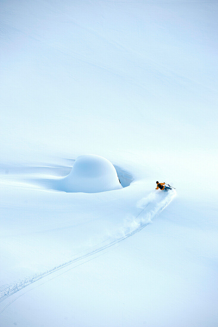 Skier skiing around a pillow, Chugach Powder Guides, Girdwood, Alaska, USA