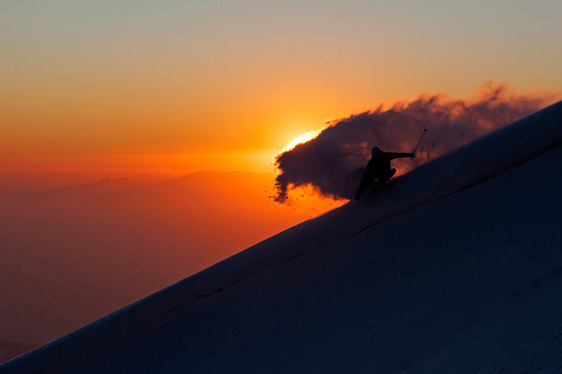 Skier in deep snow, La Parva, Chile