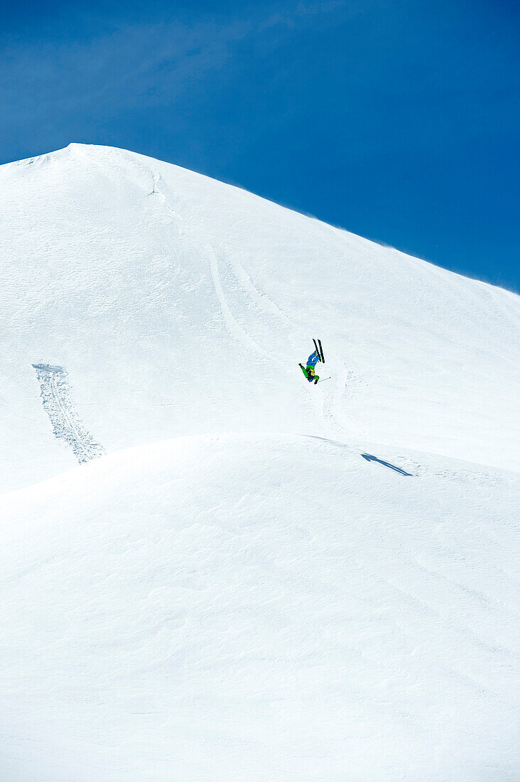 Freeskier doing a backflip, Hintertux Glacier, Zillertal, Tyrol Österreich