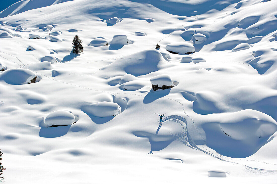 Skier armes raised, Gargellen, Montafon, Vorarlberg, Austria