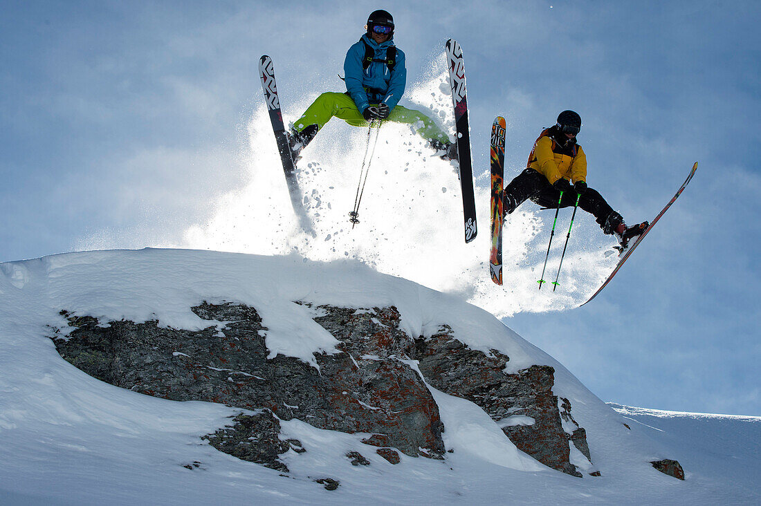 Two skiers jumping, Verbier, Bagnes, Canton of Valais, Switzerland