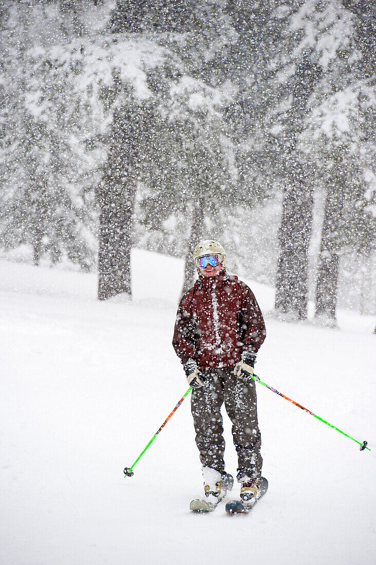 Skier in snowfall, Alyeska Resort, Girdwood, Alaska, USA