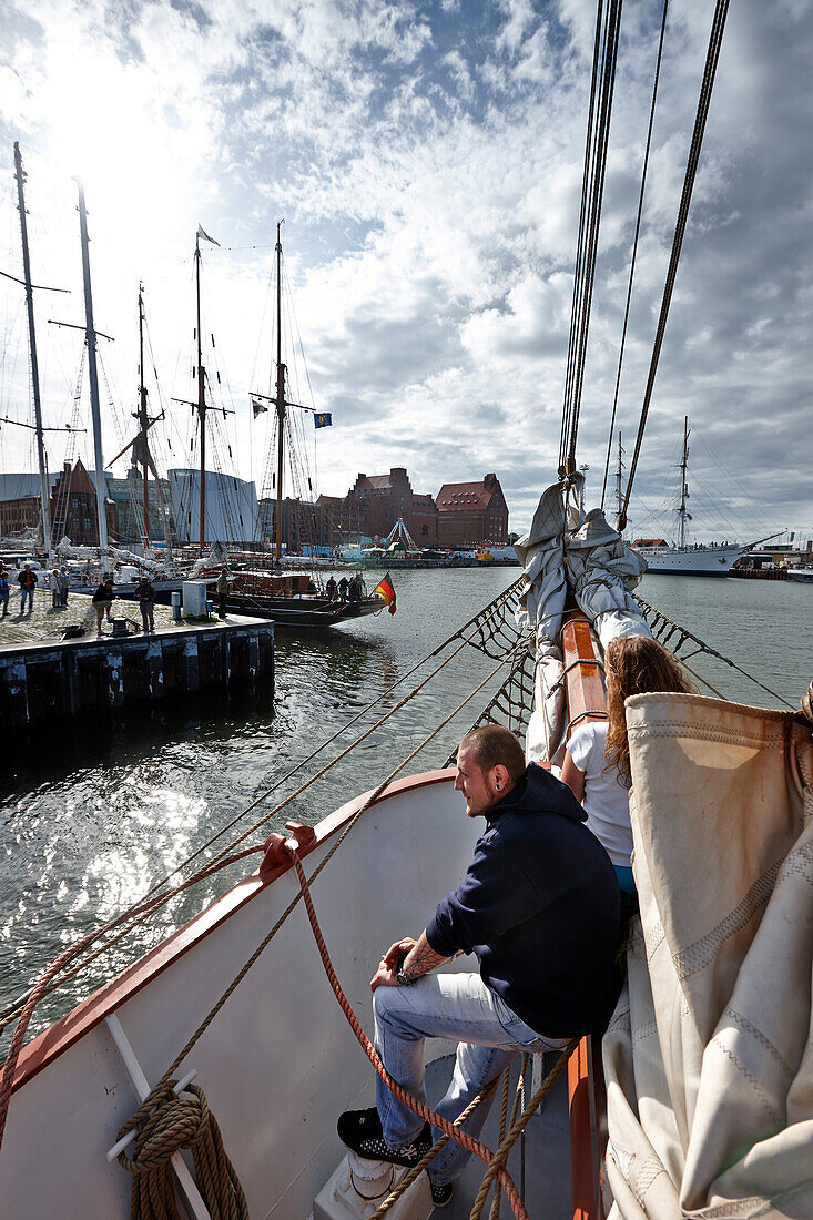 Sailing ship at landing pier in harbor, Stralsund, Mecklenburg-Western Pomerania, Germany