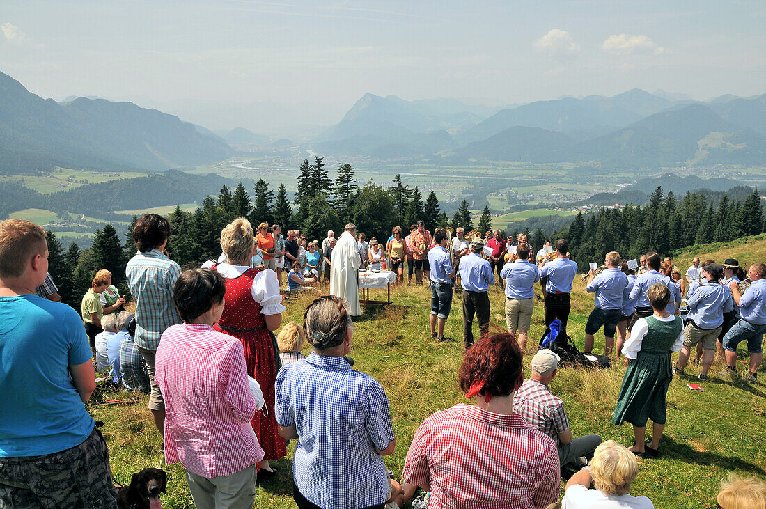 Moutain mass and church service over the Inn Valley, Bavaria, Germany