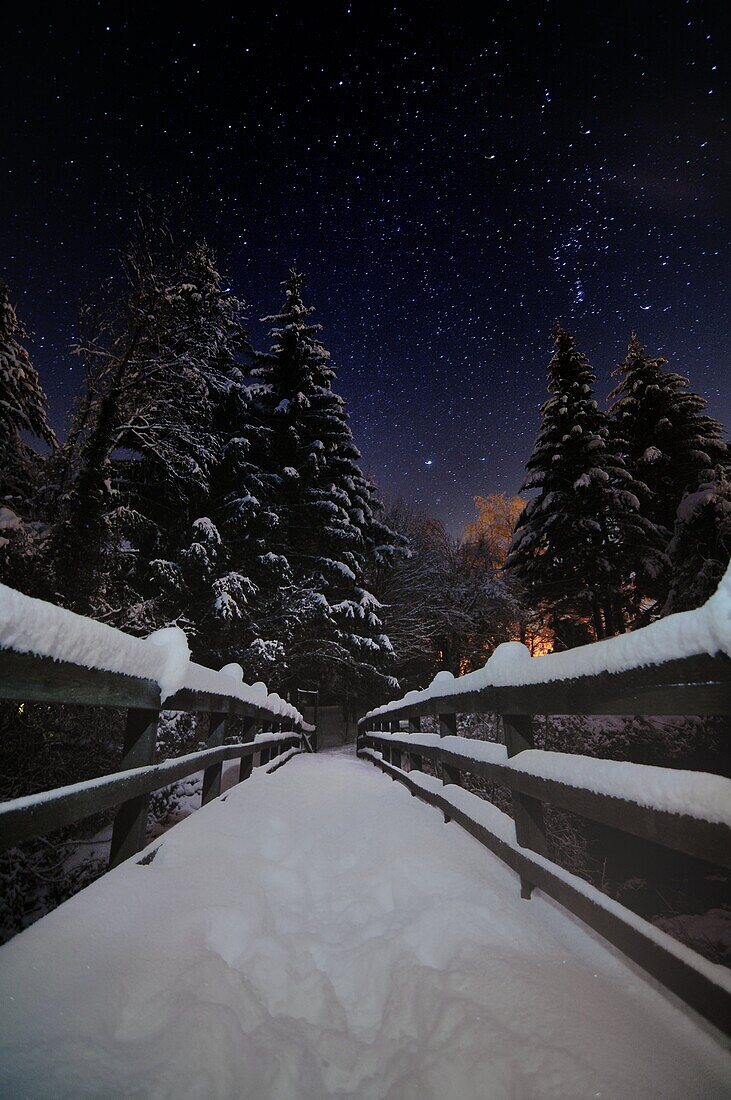 Snowy bridge after the heavy snowfall of winter 2012/2013, at the lake Fiorenzo, in Montepiano, Apennines Tuscany.