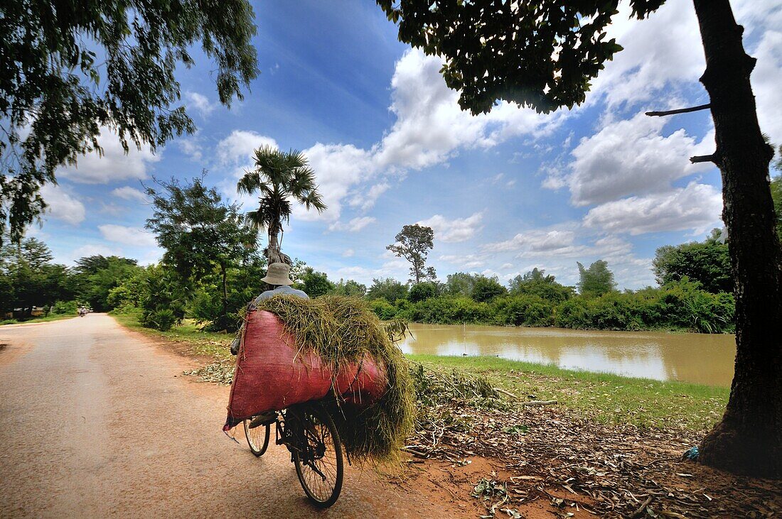 Exploring Cambodia among the vast countryside in rural villages along the river.
