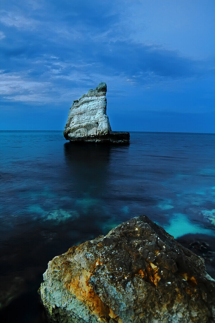 Peculiar rock conformation like at sailing boat, this site is in the Riviera of Conero m Marche region in Italy, Blu sea and trasperent water this you can find in this site .