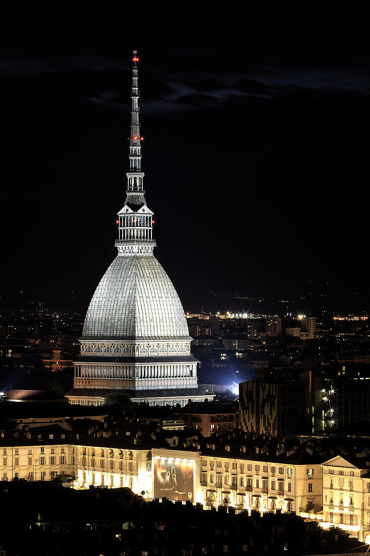 Mole Antonelliana emerging from Torino building in his night dress.