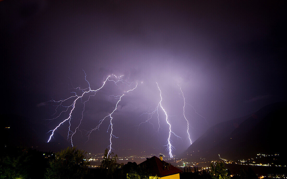 A strong thunderstorm discharge many lightning of the Merano, Val Passiria, Trentino Alto Adige, Italy