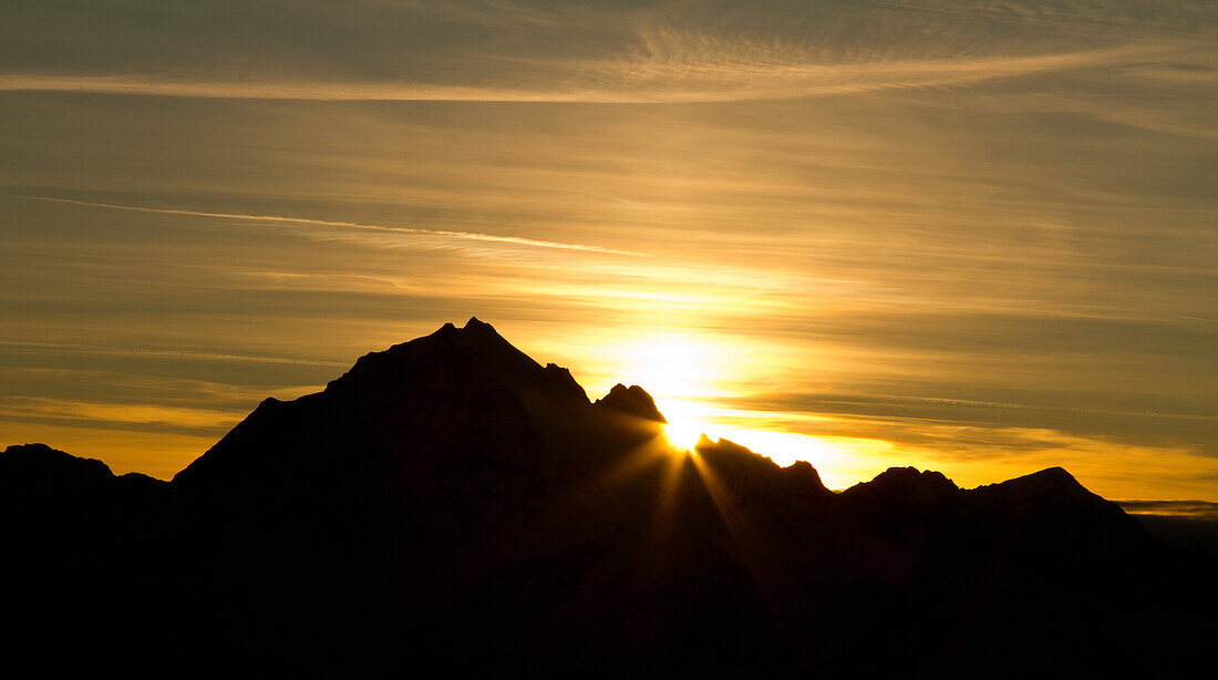 The silhouette of a peak in the sunset, Valtellina, Lombardy