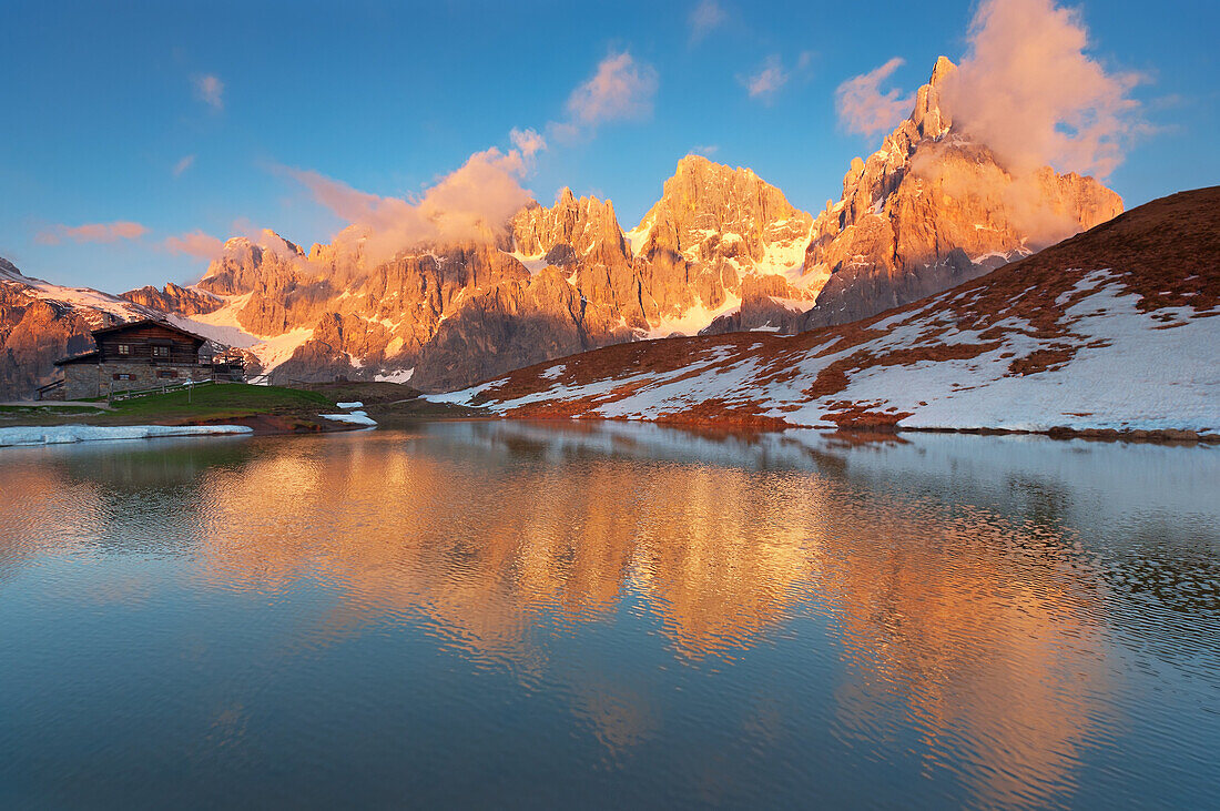 Pale di San Martino and a little lake, in a summer's sunset, Dolomites