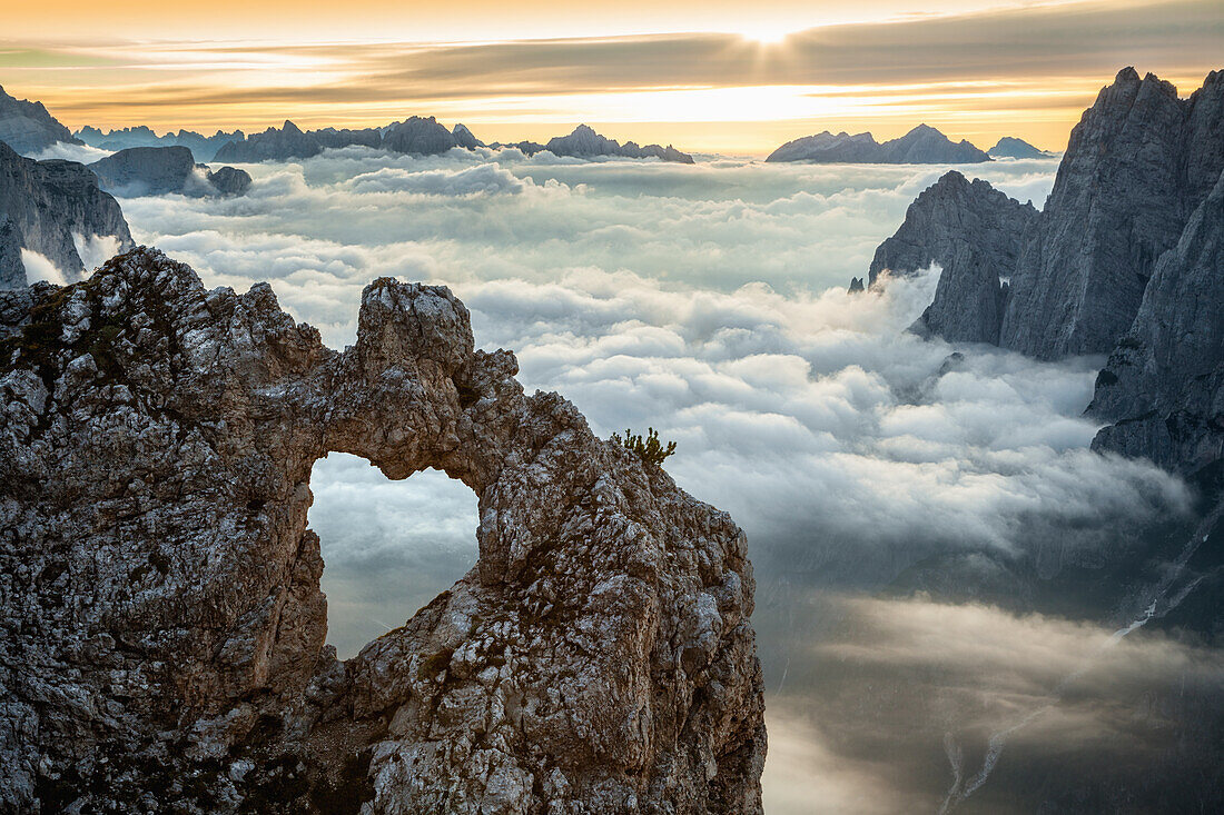 A rock's heart, on a cloud's sea, between rock walls, Dolomites, Italy