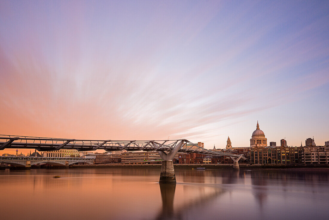 A long exposure shot with a beautiful sunrise in London
