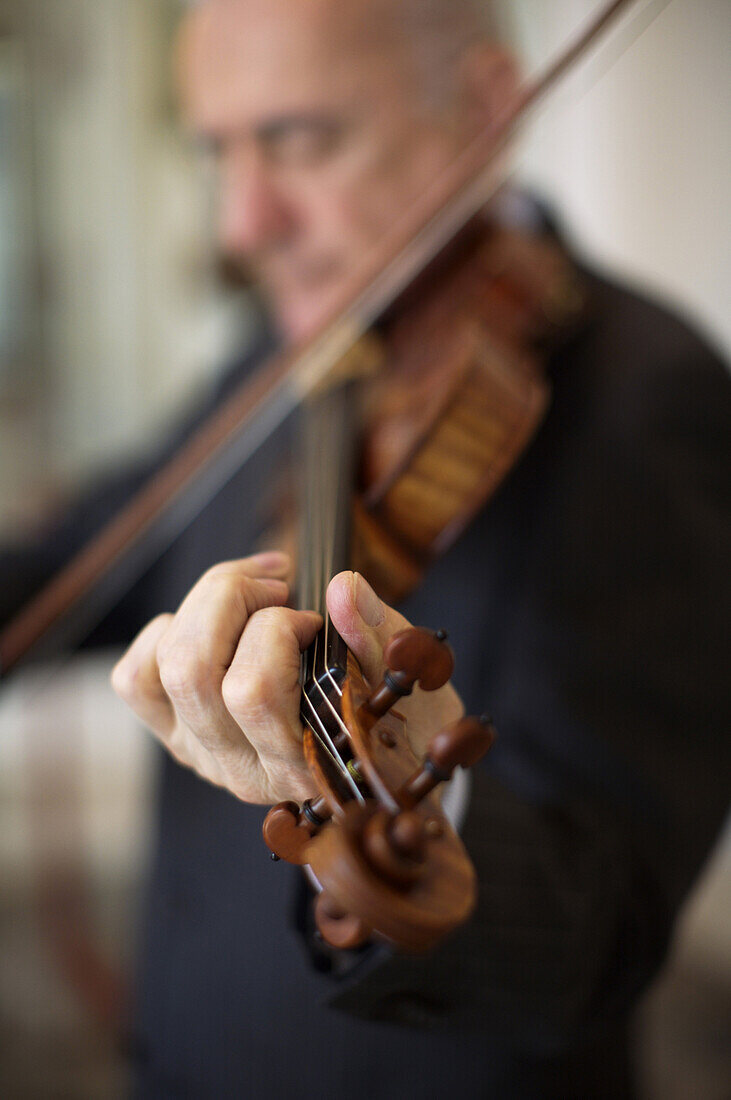 Conservatore Andrea Mosconi maintains the city of Cremona's precious violin collection, many of them Stradivarius violins, by playing them for a few minutes each morning. Cremona, Italy, has a rich history of violin making.