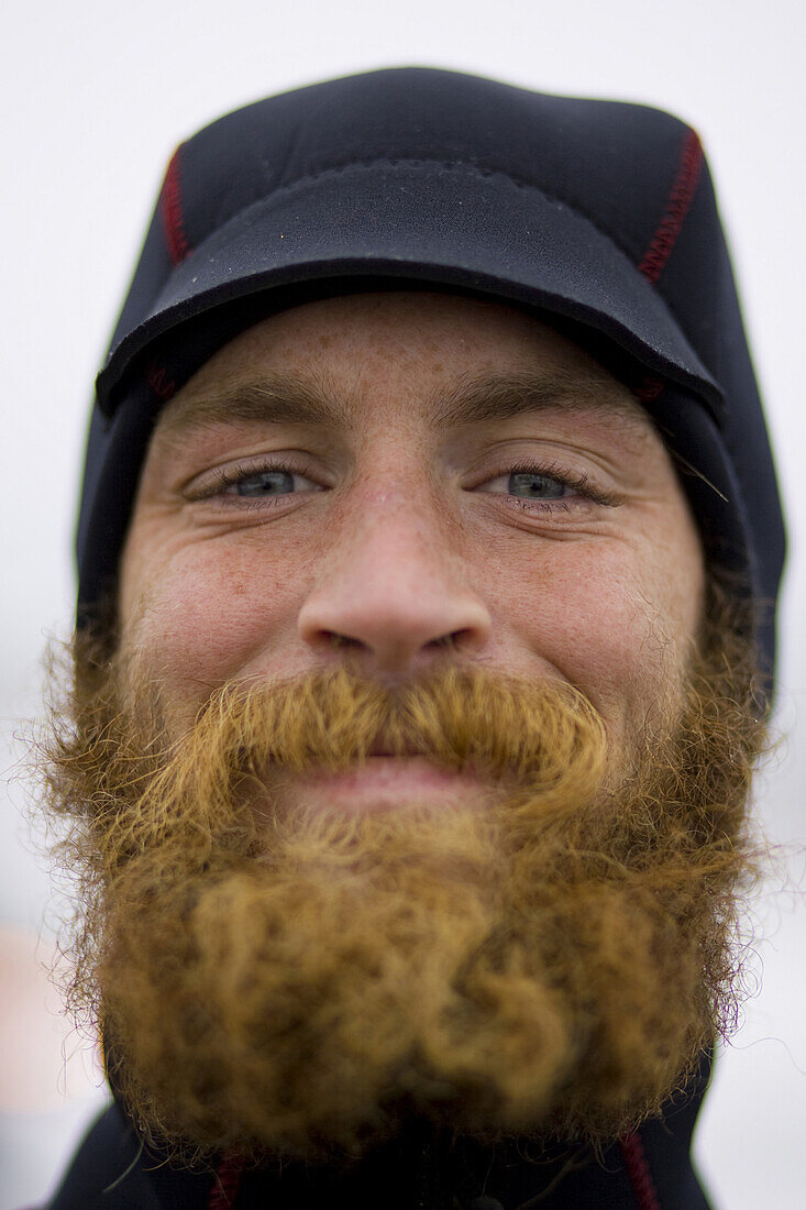 Dug suited up and ready for a winter surf session in Maine.