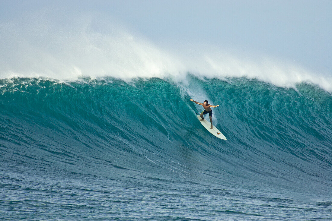 Arnold Dowling surfing at Sunset Beach, north shore, Oahu, Hawaii.