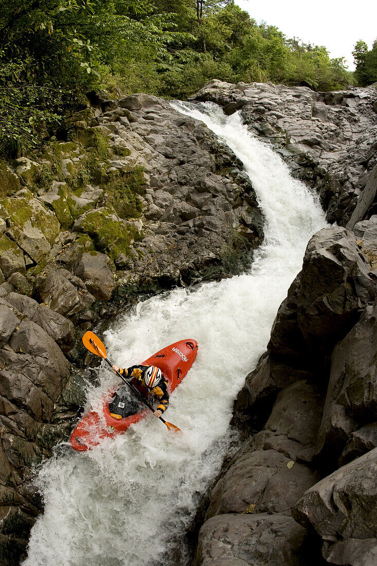 'Nick Troutman running S-Turn while kayaking the ''Roadside'' section of the Alsaseca River near Tlampacoya, Mexico.'