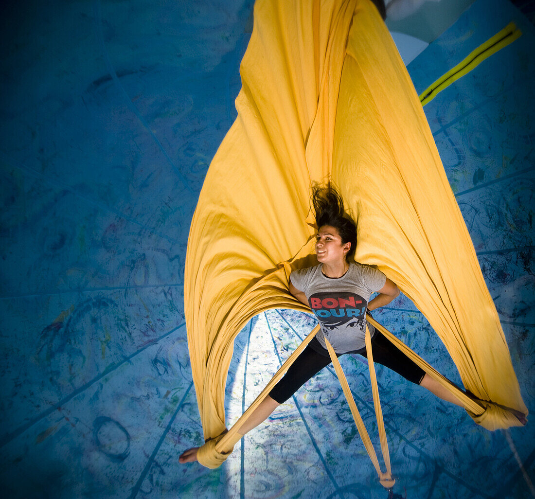 Aerialist Ninette Paloma tests the ropes inside a 40-foot inflatable float at the Solstice Parade Workshop on Thursday June 18, 2009.  The annual Summer Solstice Parade in Santa Barbara, California, features extravagant floats, whimsical costumes and crea