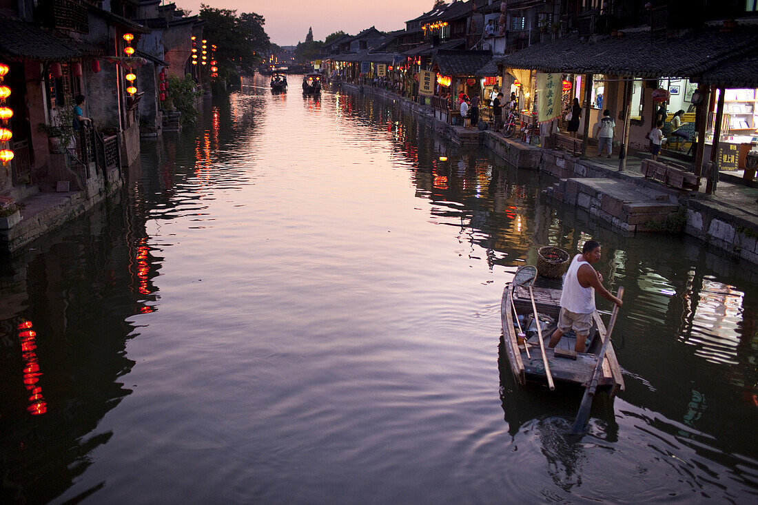 Xitang, Zhejiang Province, China - September 5,  2009: Xitang is a popular tourist town with thousands of years of history and characterized by its traditional architecture, canals and bridges. It is located one hour south of Shanghai.