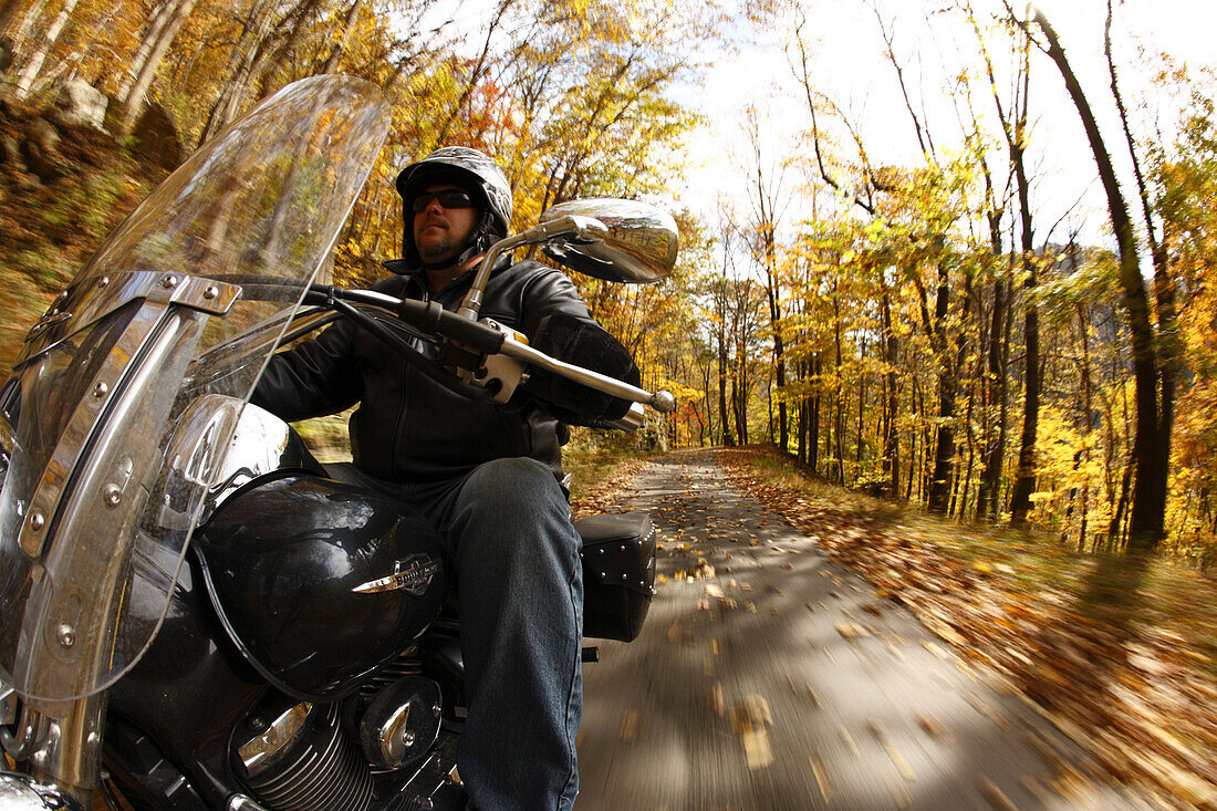Bill Corley rides his Suzuki Boulevard motorcycle down into the New River Gorge near Fayetteville, WV
