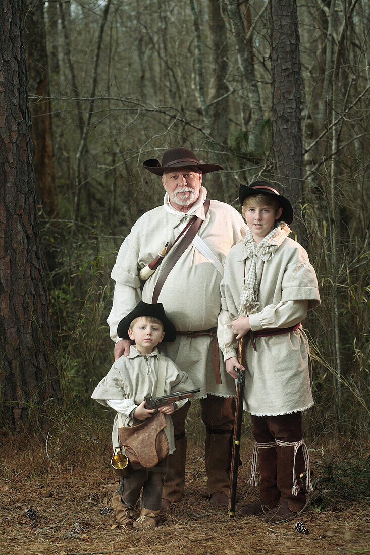 234th Anniversary of the Battle of Moores Creek Bridge, Revolutionary War - Moores Creek National Battleground. Portraits of Reenactors.   Father Don Fererro with sons Cameron Lane 12, and Brett Mills 4