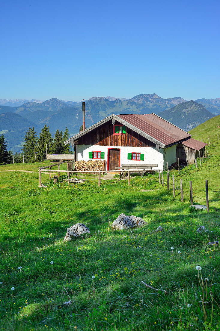 View over alpine hut to Mangfall Mountain Range in background, Spitzstein, Chiemgau Alps, Tyrol, Austria