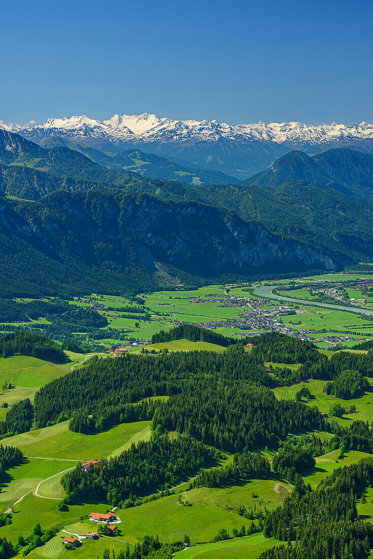 View over alpine meadows with Inn Valley and Zillertal Alps in background, Spitzstein, Chiemgau Alps, Tyrol, Austria