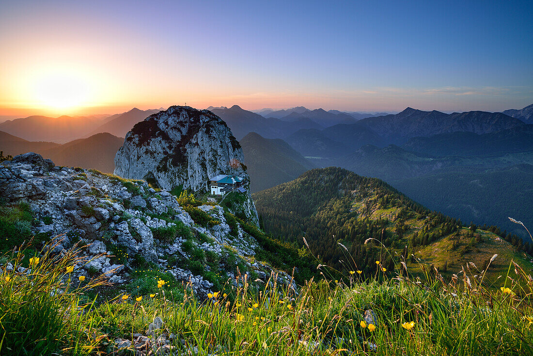 Sunrise above Buchstein with hut Tegernseer Huette, Mangfall Mountain Range, Upper Bavaria, Bavaria, Germany