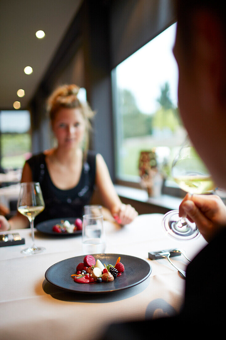 Guests in the restaurant Le Cor de Chasse, food hotel by Michelin starred gourmet chef Mario Elias, manor house built in 1681 in Durbuy, Rue des Combattants 16, Weris, Wallonia, Belgium