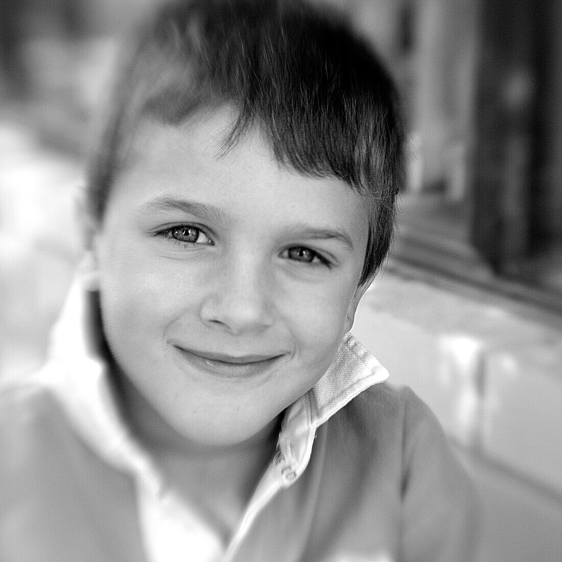 Smirking boy (black and white photo using Lensbaby technique), Borden, Western Australia, Australia