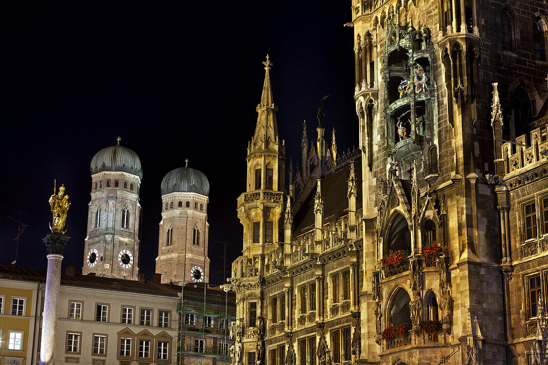 Munich Town Hall and the towers of the Frauenkirche at night, Munich, Bavaria, Germany