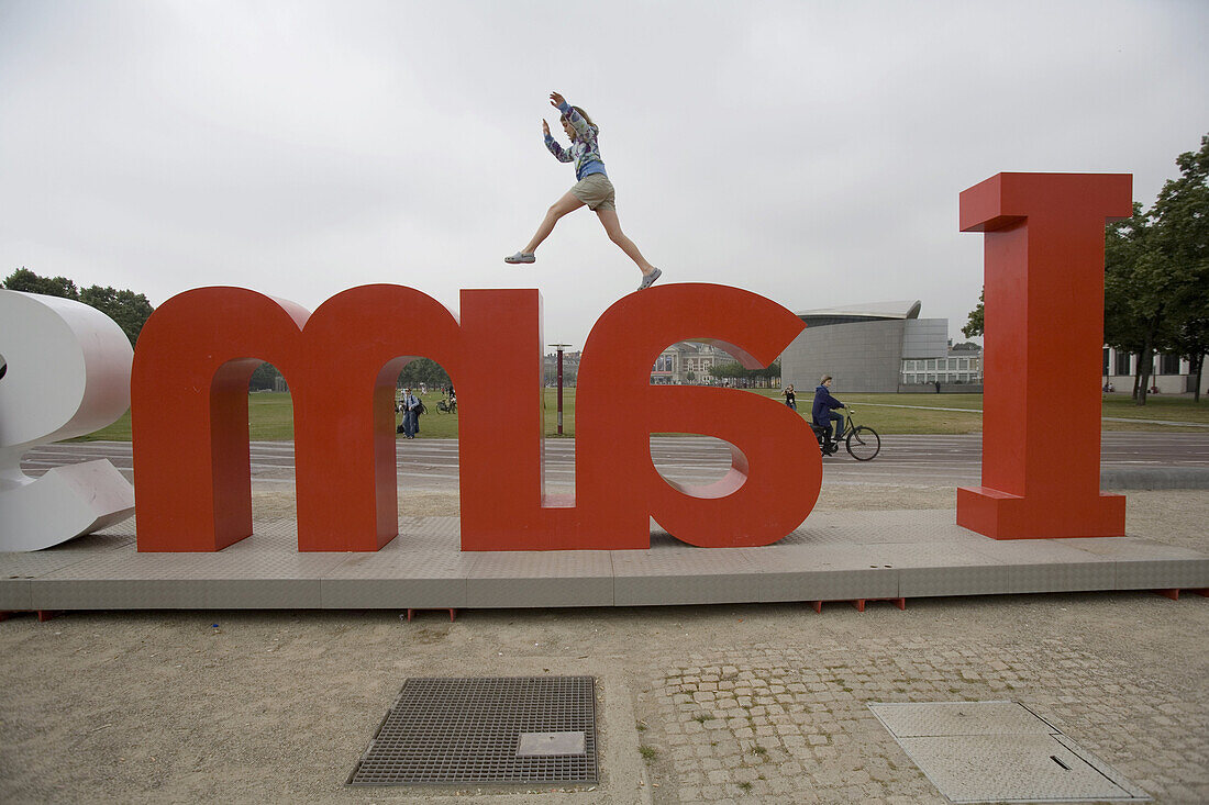 'A child plays on the 'I amsterdam,' sculpture at the Museumplein.  ''I Amsterdam is the new motto for Amsterdam and the Amsterdam Area. It is the city marketing initiative developed over the last year as a means for Amsterdam to profile itself assertivel