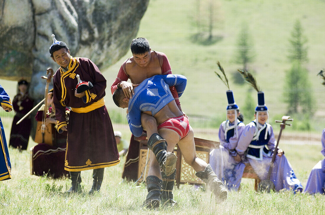 Mongolian wrestlers square off at a summer festival at the Dinosaur ger camp in Gorkhi-Terelj National Park. Wrestling is one of Mongolia's three national sports, and during the summer competitions are held throughout the country, including during Naadam,
