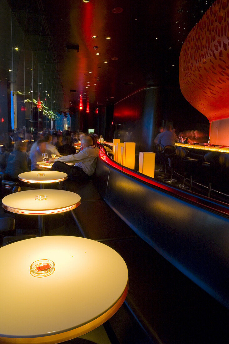 A group of people enjoy cocktails at Mix, the ultra modern stylish bar and lounge at THEHotel at Mandalay Bay in Las Vegas, Nevada.