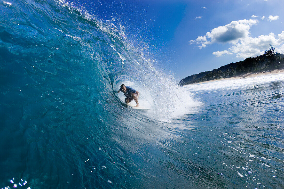 Jack Johnson surfing at Rocky point, north shore, Oahu, Hawaii