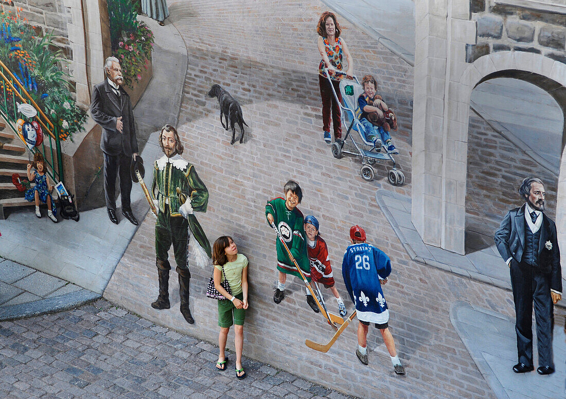 Mural with child in Quebec City Canada.  The young girl is a US tourist.Releasecode: SRG_AMG_96