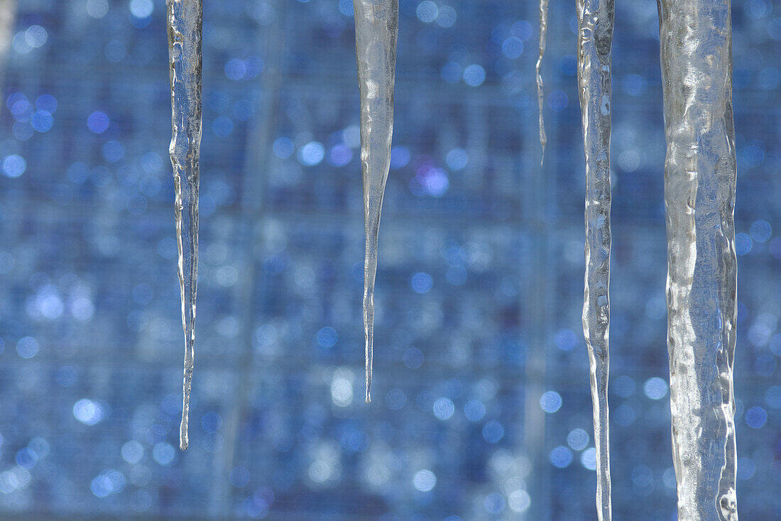 Solar panels and icicles  hanging off roof, Durango, Colorado.